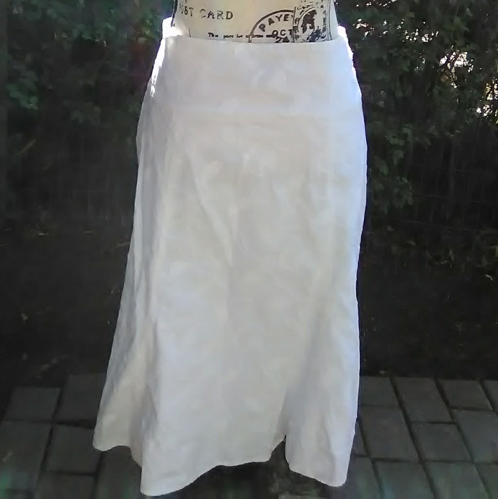 White textured skirt by " Jones Wear Studio "